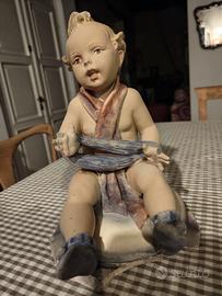 Scultura bambino  con lana di Arturo Pannunzio