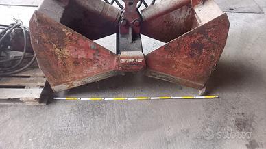 Benna idraulica autocaricante