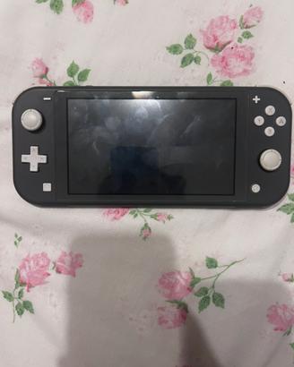 LOTTO switch lite grigia + 4 giochi e caricatore