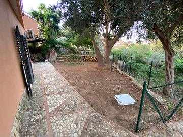 Bilocale arredato con giardino privato