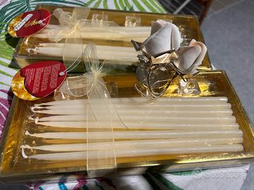 Set portacandele e candele al prezzo totale di