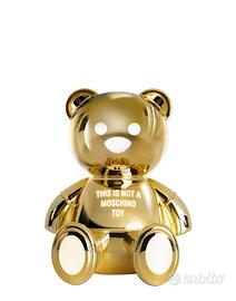 Lampada da tavolo modello TOY GOLD di KARTELL