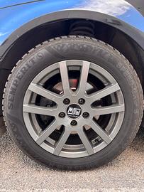 Set 4 cerchi in lega OZ + gomme invernali