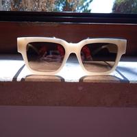 occhiali da sole Polaroid lenti giallo scuro