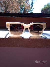 occhiali da sole Polaroid lenti giallo scuro