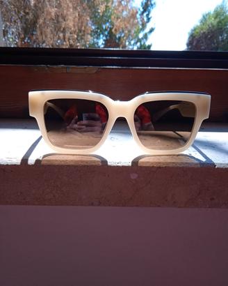 occhiali da sole Polaroid lenti giallo scuro