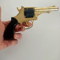 Pistola giocattolo vintage a tamburo 