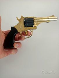 Pistola giocattolo vintage a tamburo 
