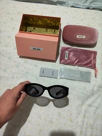 Occhiali da sole Miu Miu SMU 11W Neri 