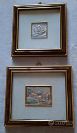 Coppia quadri su lastra in argento, cornici legno