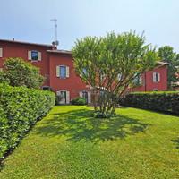 Quadrilocale con giardino privato e box