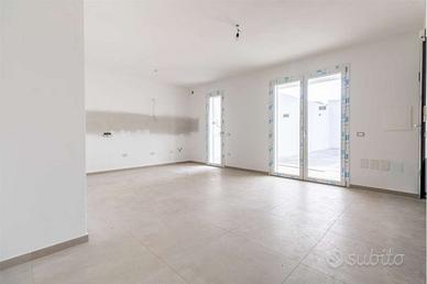 Trilocale al piano terra con giardino