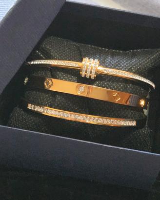Set di Bracciali in acciaio placcato oro e zi