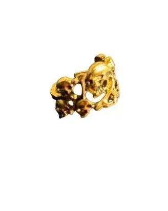 Anello dorato con teschio