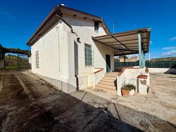 Casa e terreno