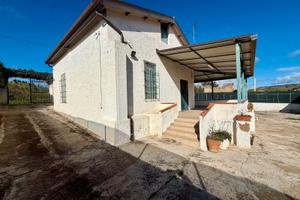 Casa e terreno