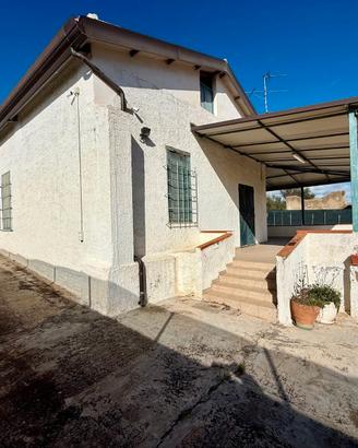 Casa e terreno