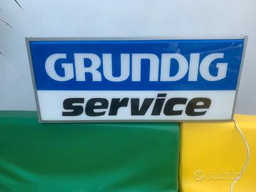 insegna luminosa Grundig