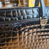 borsa e portafoglio in coccodrillo 