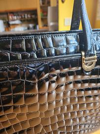 borsa e portafoglio in coccodrillo 