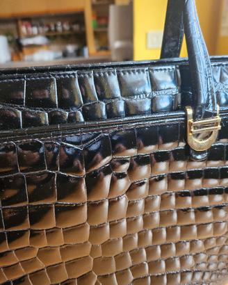 borsa e portafoglio in coccodrillo 