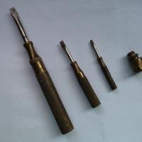 Antico giravite tre in uno